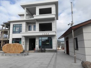 陵水临国道边1000平米宅基地带三层楼别墅转让环境清幽舒适